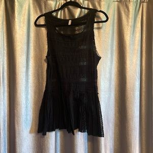 Gently loved free people black peplum top